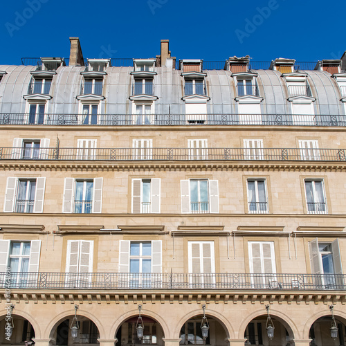 Paris, the beautiful Rivoli street, typical facade and windows 
