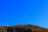 青空に描く飛行機雲