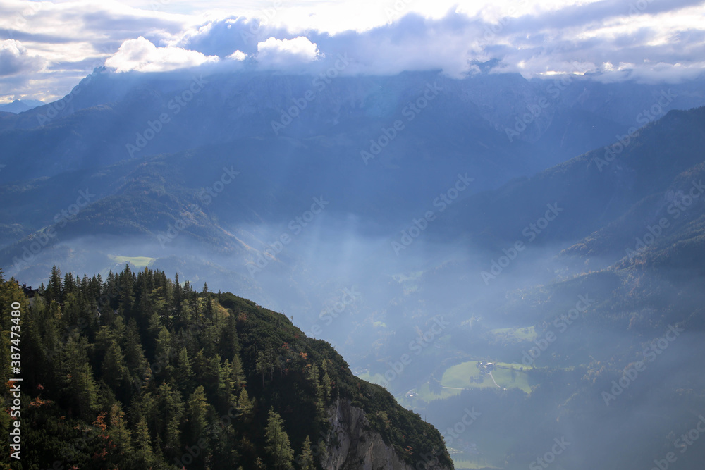 View of mountains and valley in the Alps near Hallein, Austria on a misty morning