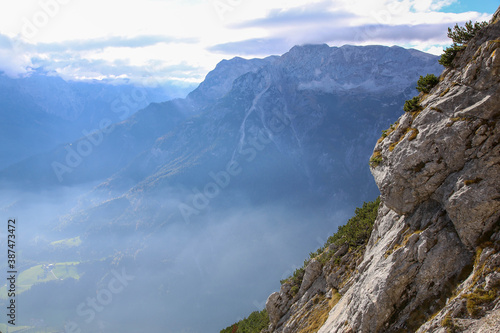 View of mountains and valley in the Alps near Hallein, Austria on a misty morning