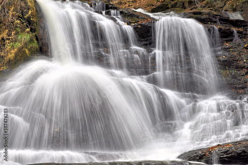 Scenic location near Wilton  New Hampshire. Powerful Garwin Falls with curtains of water plunging down steep rocky ledge.