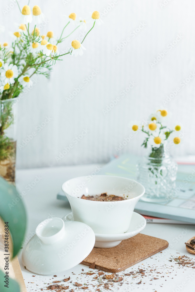 Gaiwan with tea and flowers Gaiwan with tea and flowers