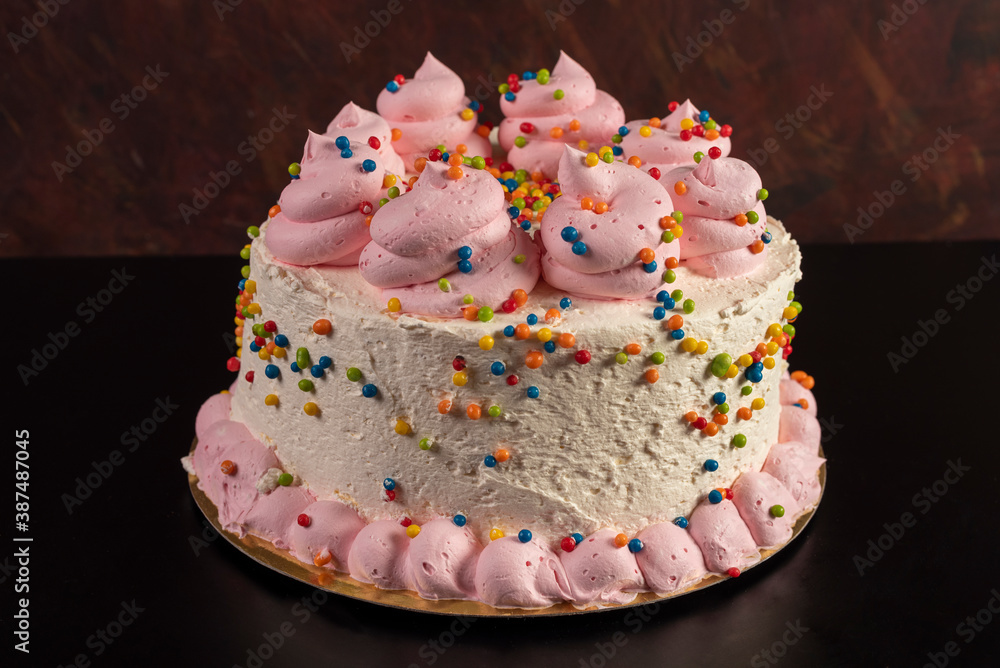 party cake for events, with cream, chocolate, cherry colored sprinkles, very delicate decorated kiwis party cake for events, with cream, chocolate, cherry colored sprinkles, very delicate decorated kiwis