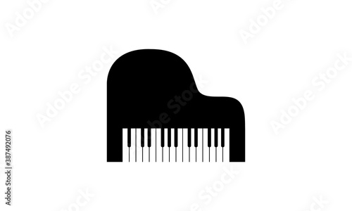 Blank black vector of a grand piano with cut out keys isolated against a white background. Graphic has blank empty copy space with room for text or images. Great for musical branding, symbols, icons.