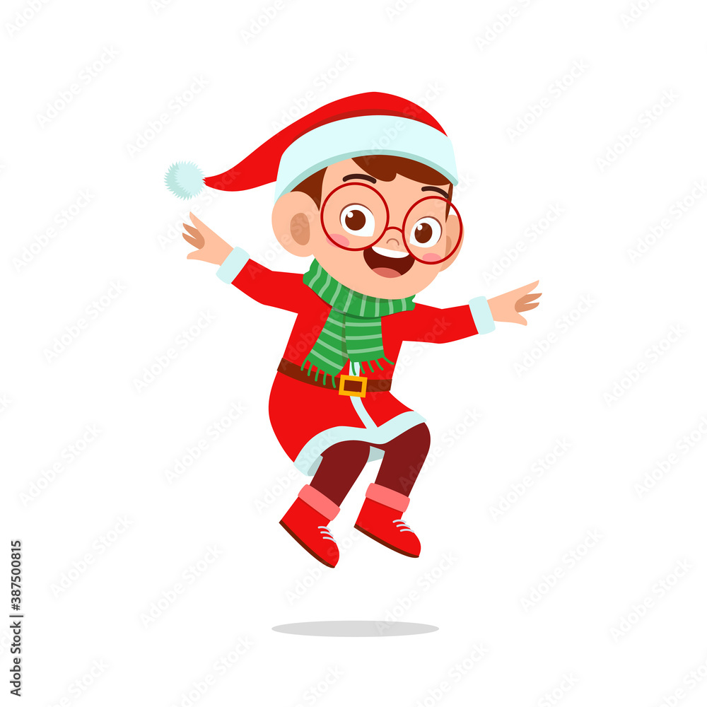 happy cute little kid boy and girl wearing red christmas costume and jump happy cute little kid boy and girl wearing red christmas costume and jump