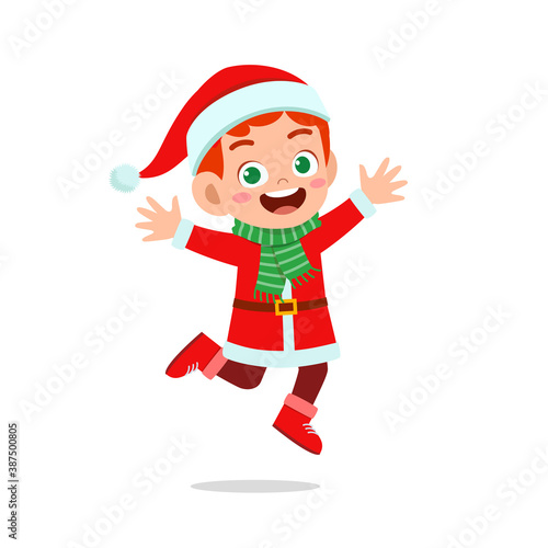 happy cute little kid boy and girl wearing red christmas costume and jump © Colorfuel Studio