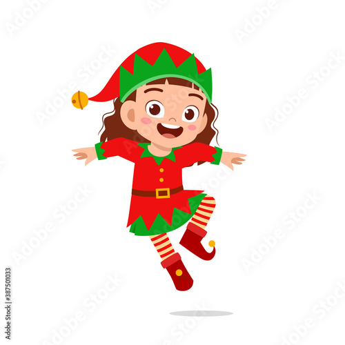 happy cute little kid boy and girl wearing green elf christmas costume