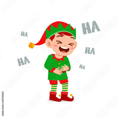 happy cute little kid boy and girl wearing green elf christmas costume and laugh loud