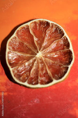 Dry slice of lime fruit in colorful background modern high quality prints fifty megapixels print