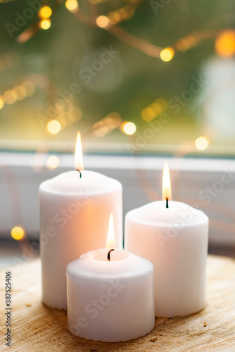 three burning candles