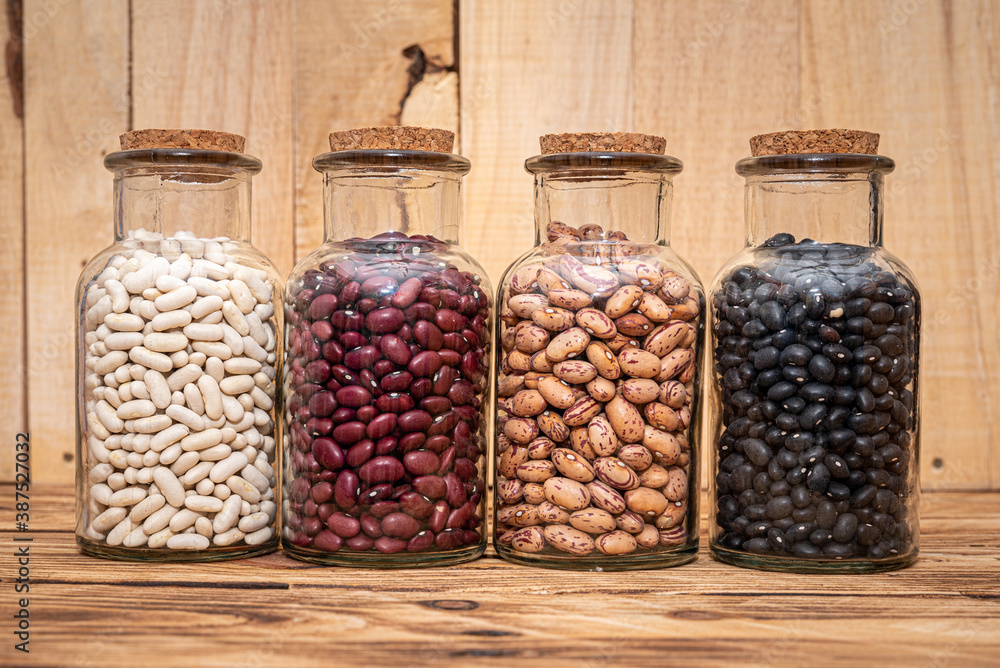 Four Jars of dried beans, White, Borlotti, Black and Kidney Beans
