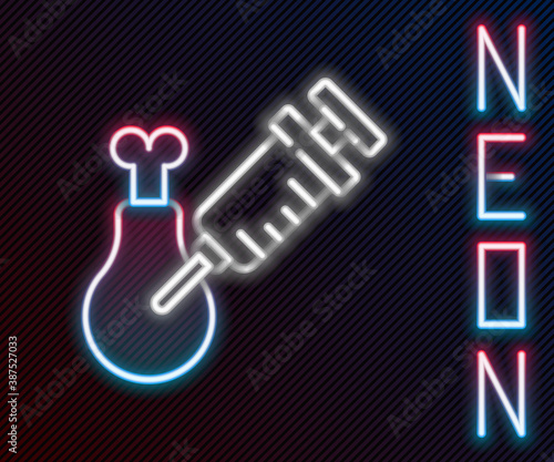 Glowing neon line Gmo research chicken icon isolated on black background. Syringe being injected to chicken. Colorful outline concept. Vector.