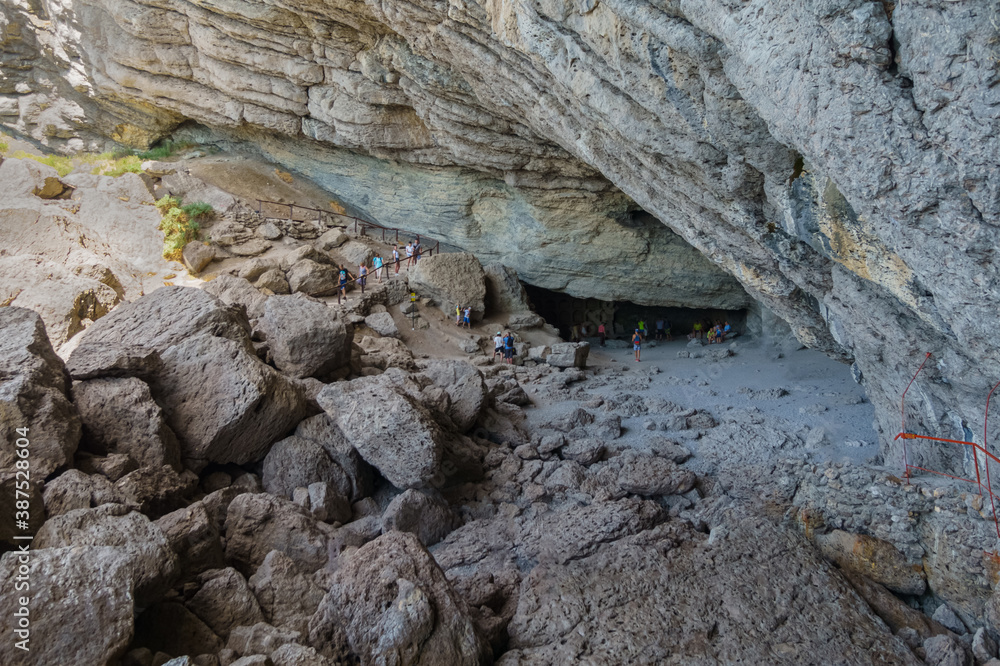 Obraz premium Chaliapin Grotto at the Golitsyn Trail near Novy Svet. It was cut out into the slope of Mount Koba-Kaya (Eagle Mountain). Travel and nature.
