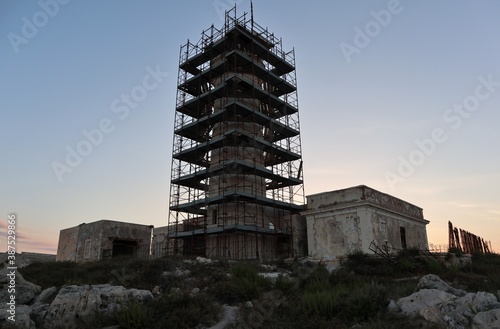 Siracusa - Faro di Punta Murro di Porco al tramonto photo