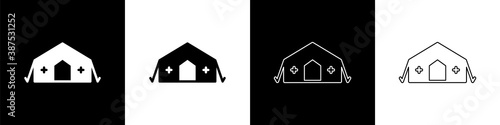 Set Military medical tent providing first aid to a patient icon isolated on black and white background. Medical tent free aid to people. Vector.