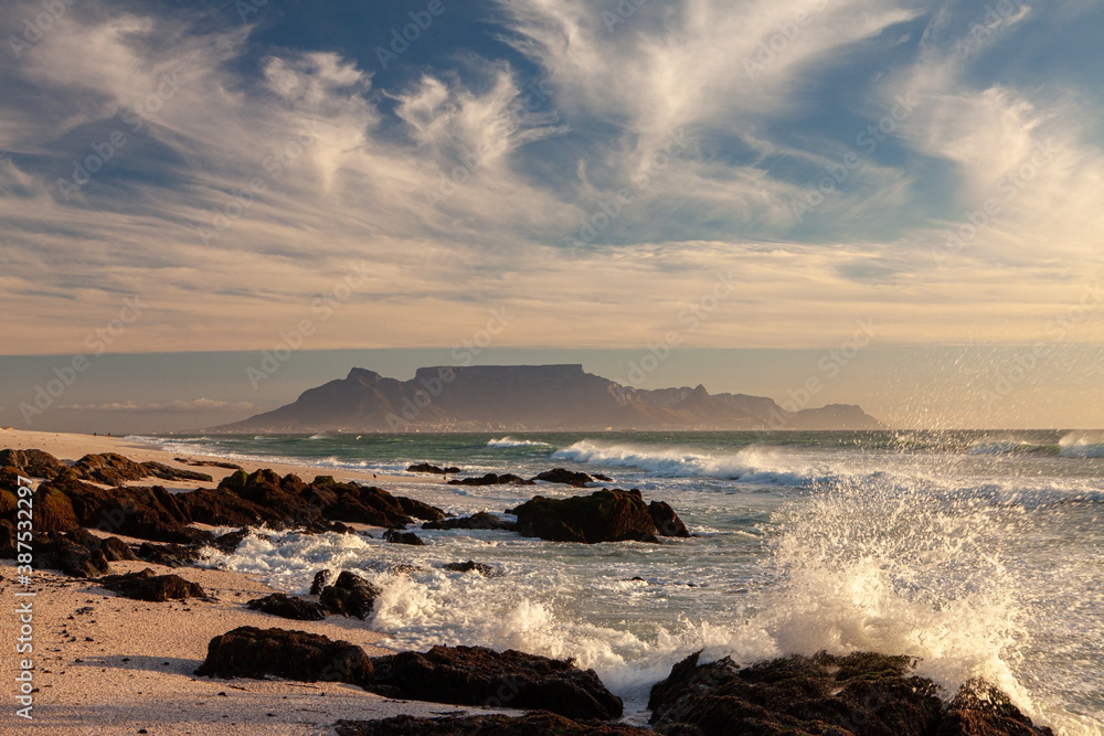 scenic view of table mountain in cape town south africa from blouberg strand with splashing waves scenic view of table mountain in cape town south africa from blouberg strand with splashing waves