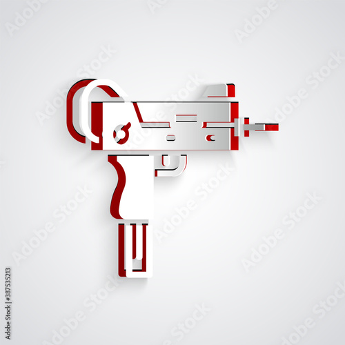 Paper cut UZI submachine gun icon isolated on grey background. Automatic weapon. Paper art style. Vector.