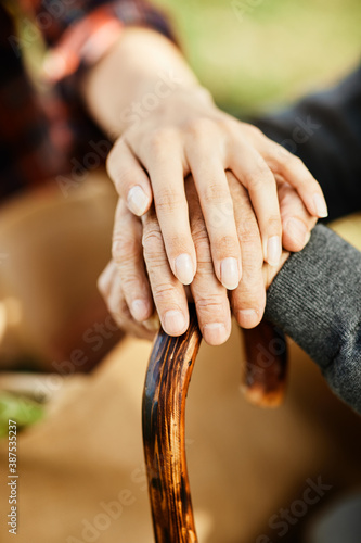 nurse senior care caregiver help assistence retirement elderly man family love daughter hand close up