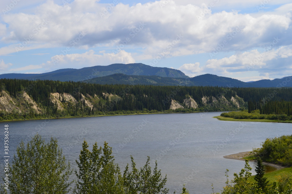 Road tripping through the beautiful landscapes of the Alaskan Highway in the Yukon territory of Northern Canada