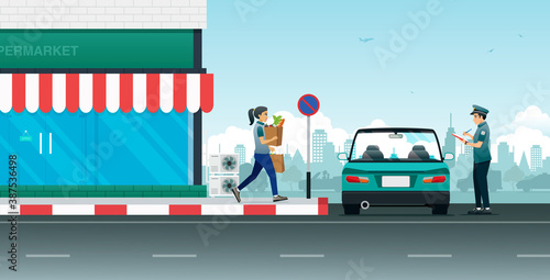 The police are writing traffic orders for cars parked in prohibited areas.