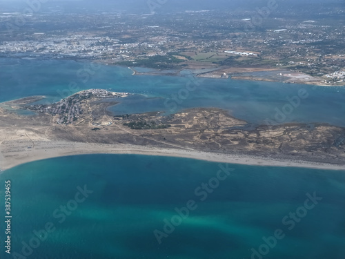Aerial view of the beautiful Algarve coast in Portugal seen on a flight to Faro © Stimmungsbilder1
