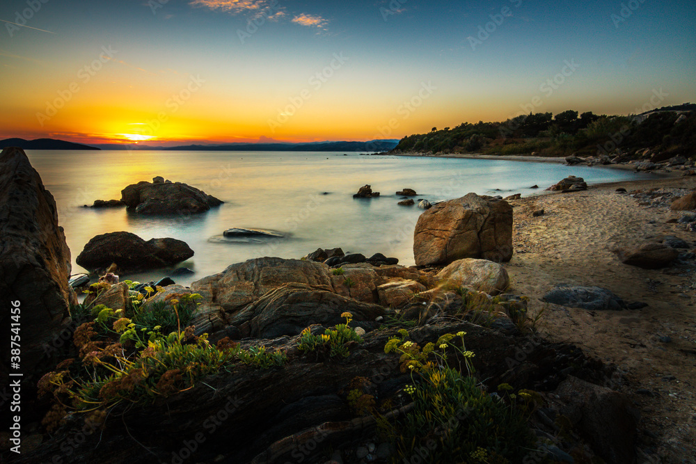 Sunrise or sunset in Greece by the sea. Nice beach photo and landscape. Counter-shot in the morning with great clouds Sunrise or sunset in Greece by the sea. Nice beach photo and landscape. Counter-shot in the morning with great clouds