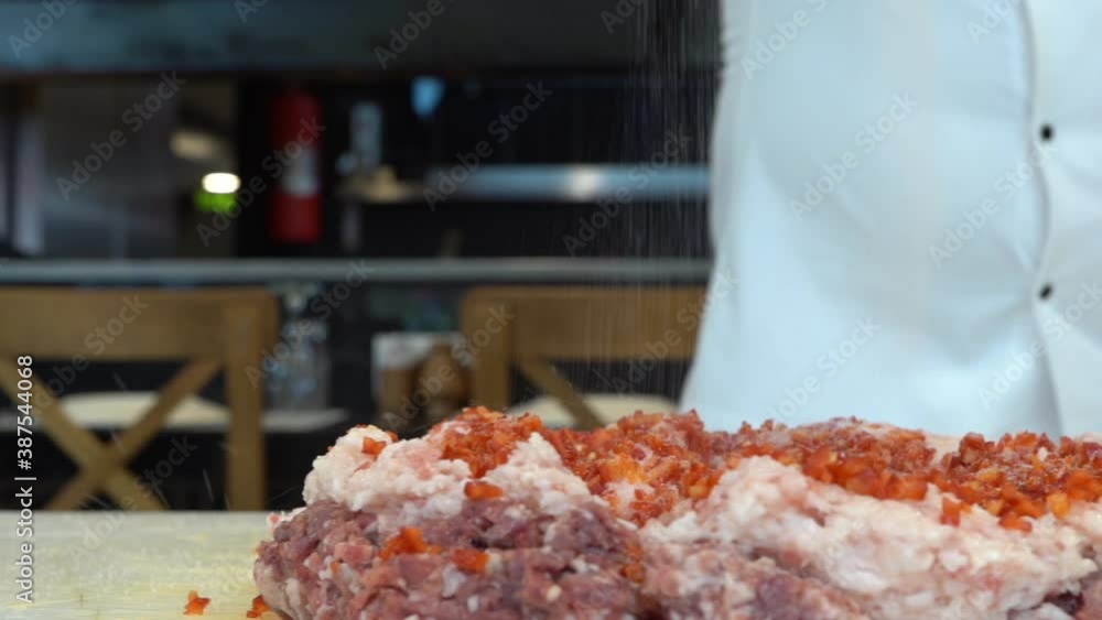 meat kebab restaurant chefs, making minced meat in Turkey. Meat mincing