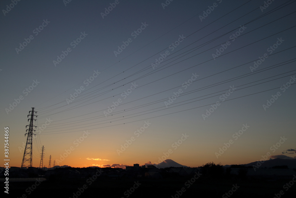 sunset scene, Mt. Fuji and transmission tower and line, Japanese autumn photography