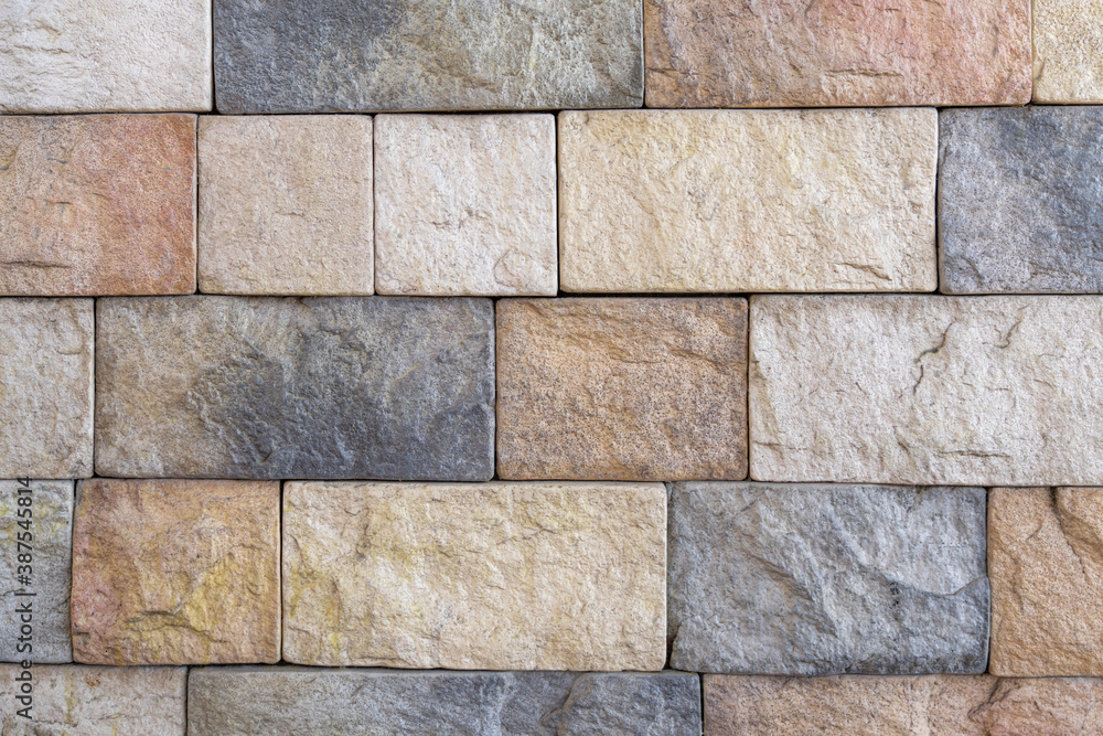 Fototapeta premium Background of brick stone wall texture. Close up image. Outdoor