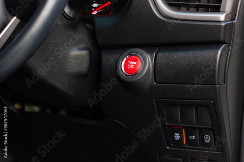 Close up engine car start button. Start stop engine modern new car button,Makes it easy to turn your auto mobile on and off. a key fob unique ,selective focus