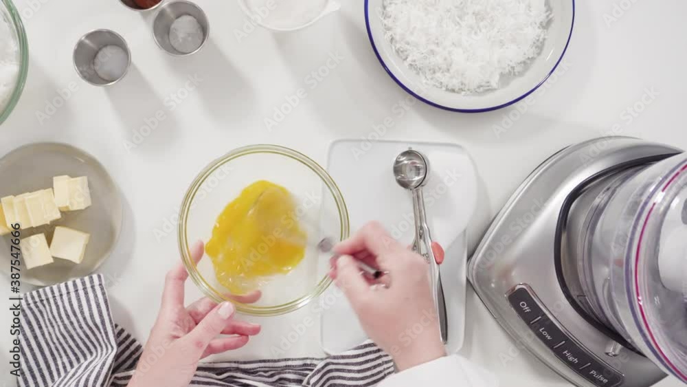 Flat lay. Mixing ingredients in a food processor to prepare homemade coconut cookies. Flat lay. Mixing ingredients in a food processor to prepare homemade coconut cookies.