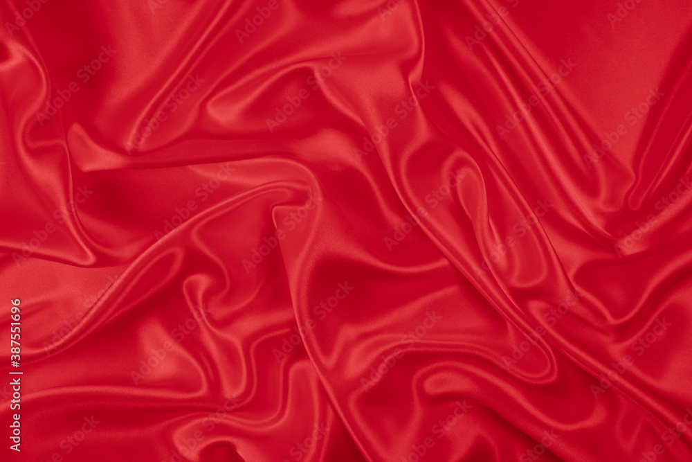 Beautiful elegant wavy hot red satin silk luxury cloth fabric texture, abstract background design. Wallpaper, banner or card Beautiful elegant wavy hot red satin silk luxury cloth fabric texture, abstract background design. Wallpaper, banner or card