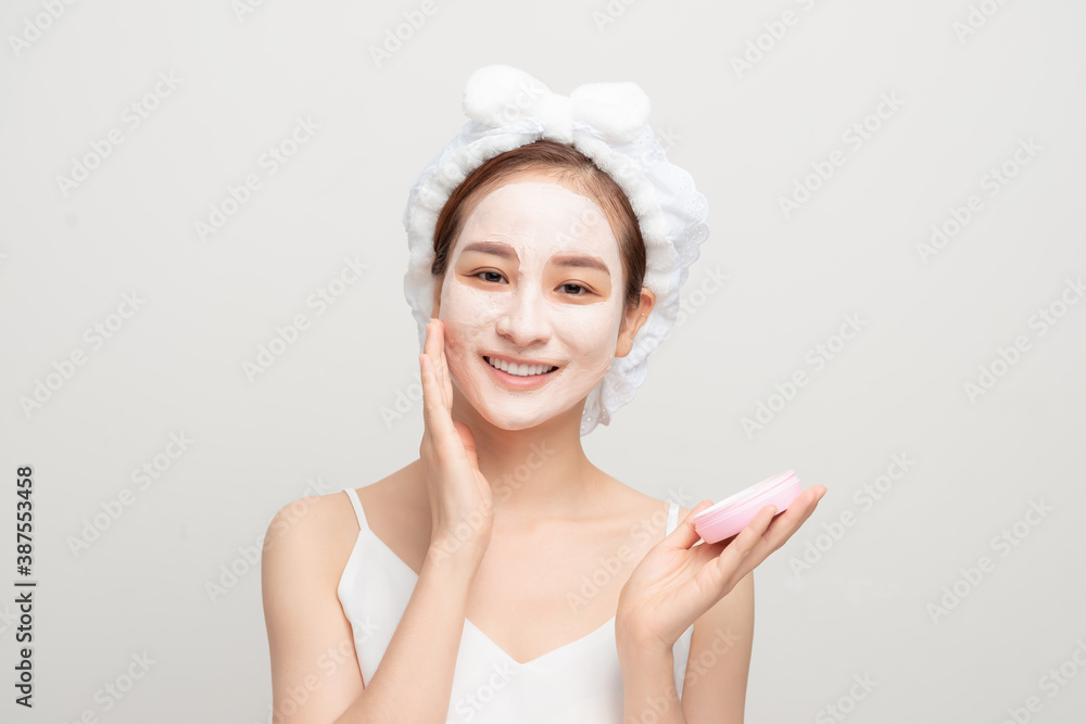Spa girl applying facial mask. Beauty treatments. Spa girl applying facial mask. Beauty treatments.