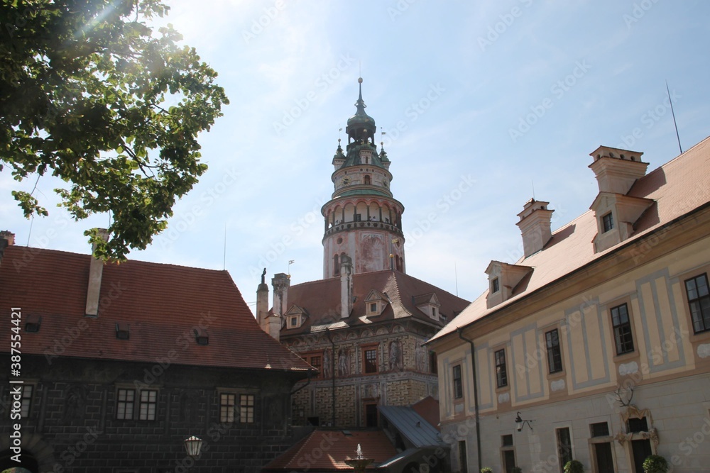Cesky Krumlov, tower of the castle against summer sun