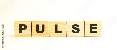 Wooden cubes with letters. Wooden cubes on a white background.