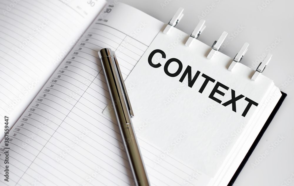 text CONTEXT on the short note texture background with pen text CONTEXT on the short note texture background with pen