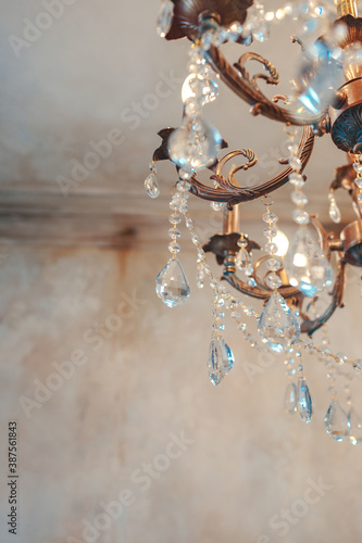 Vintage chandelier in the old interior.
