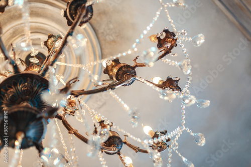 Vintage chandelier in the old interior.