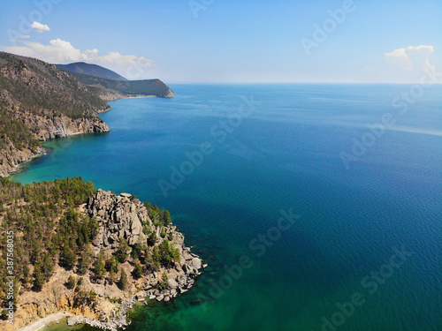 Beautiful view of the bays of lake Baikal on a Sunny summer day. Aerial view