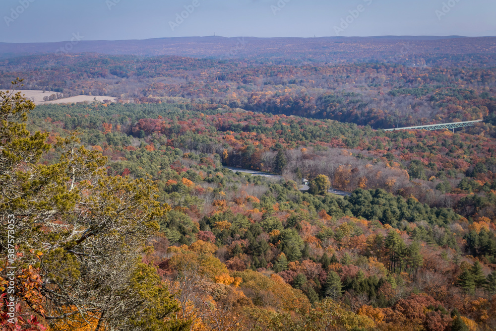 The Milford Bridge from a scenic overlook surrounded by brilliant fall foliage