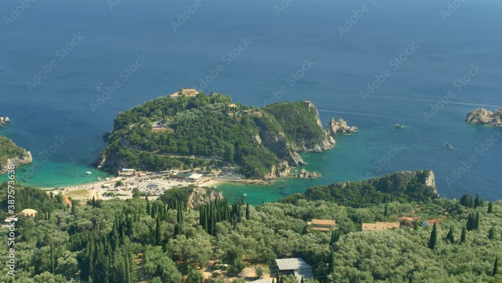 Corfu rocky coastline - green hills and turquoise sea, Greece
Corfu rocky coastline - green hills and turquoise sea, Greece