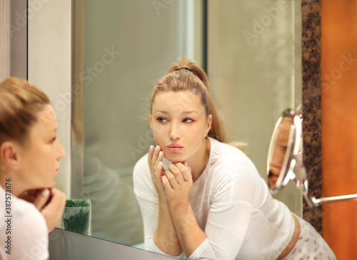 Magic anti-aging cream.Applying the cream 