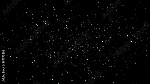 Abstract magic colored dust fly in the dark - Elegant colored dust particles glimmering on black background slowly fly.