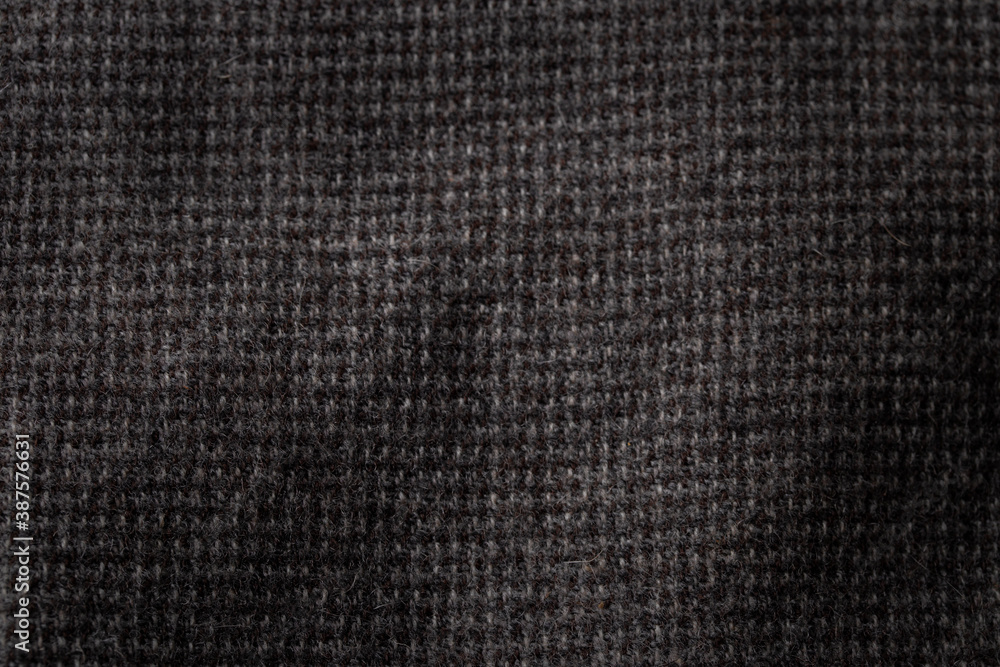 Grey cotton texture background. Detail of sweater fabric surface. Grey cotton texture background. Detail of sweater fabric surface.