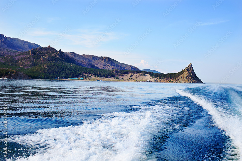 Beautiful view of the bays of lake Baikal on a summer day. View from the yacht. Beautiful view of the bays of lake Baikal on a summer day. View from the yacht.