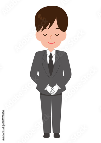 お辞儀して挨拶する男性スタッフ