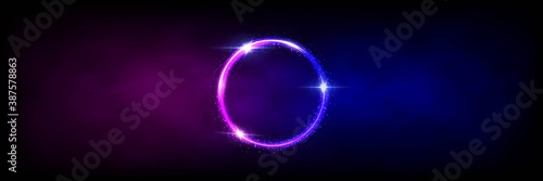 Neon round shape or laser glowing pink and blue lines in fog