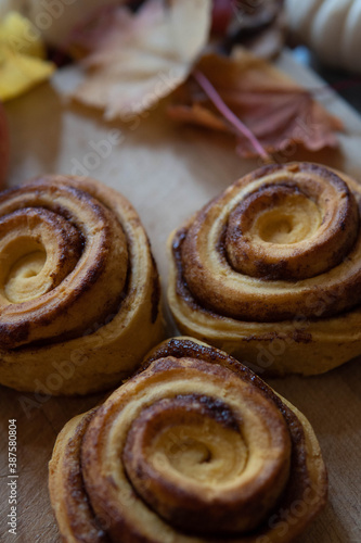 cinnamon rolls on wooden board