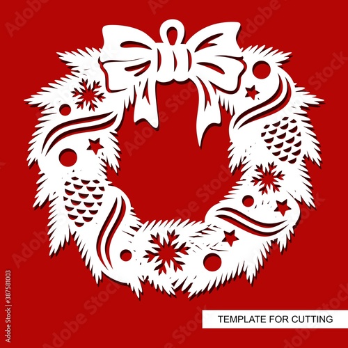 Hanging decoration - a Christmas wreath of fir branches, cones, snowflakes, stars, ribbons and a large bow. New Year vector template for plotter laser cutting (cnc) of paper, cardboard, plywood, wood.