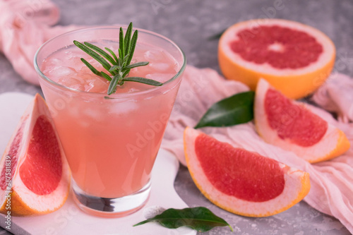 Grapefruit drink with ice. Close-up.